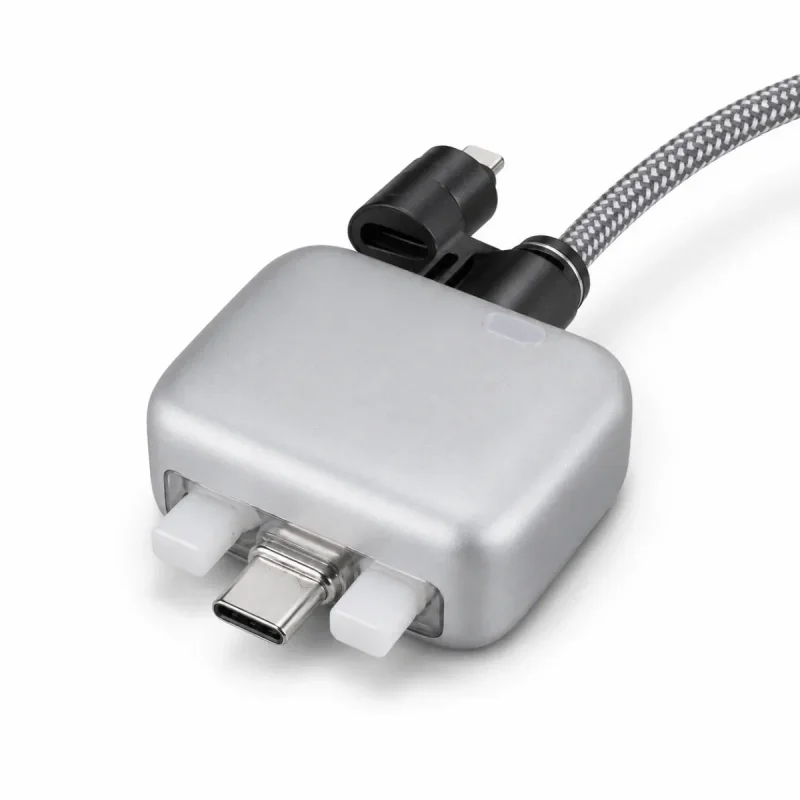 Close-up of a silver 3-in-1 universal charging cable with braided cord, featuring Type-C, Lightning, and Micro-USB connectors.